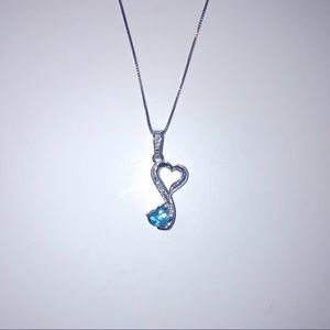 Sterling silver blue topaz heart pendant on chain